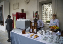 Yalta Annual Metting lobby with a cup of coffee 