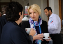 Yalta Annual Metting lobby with a cup of coffee 