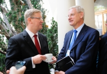 Yalta Annual Metting lobby with a cup of coffee 