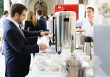 Yalta Annual Metting lobby with a cup of coffee 