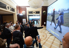 Opening of the Russian War Crimes Exhibition during Informal YES Gathering "One Year - Stay in Fight"