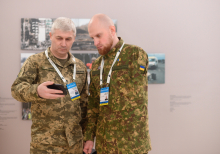 Opening of the Russian War Crimes Exhibition during Informal YES Gathering "One Year - Stay in Fight"